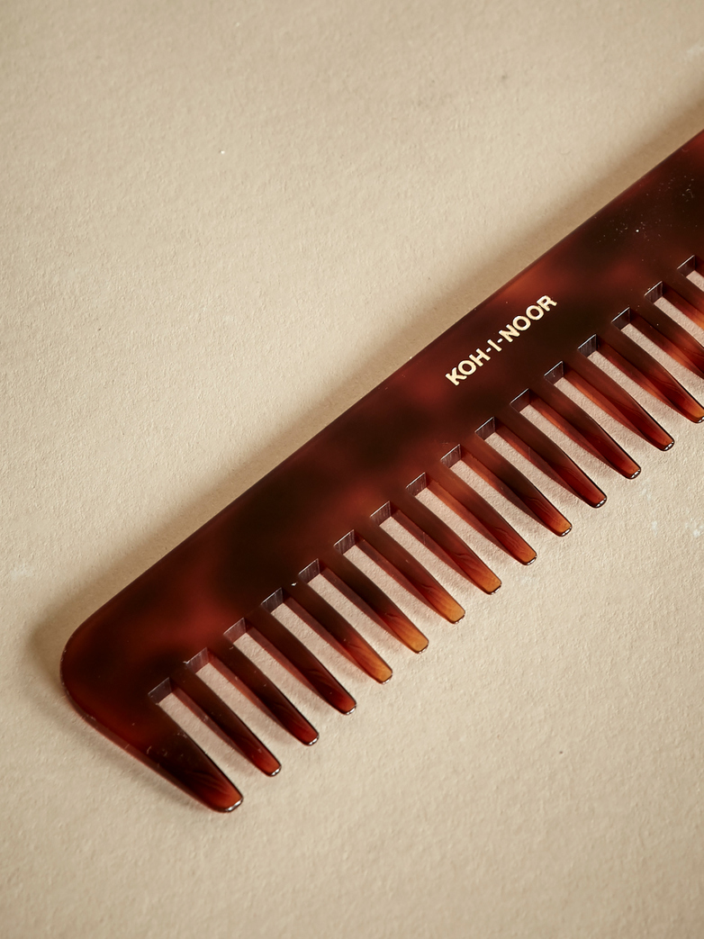 Comb with Spaced Pegs