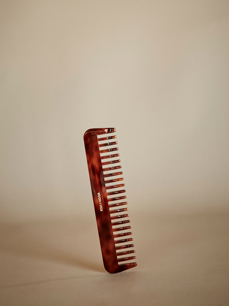 Comb with Spaced Pegs