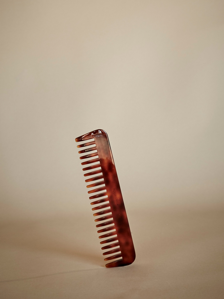 Comb with Spaced Pegs