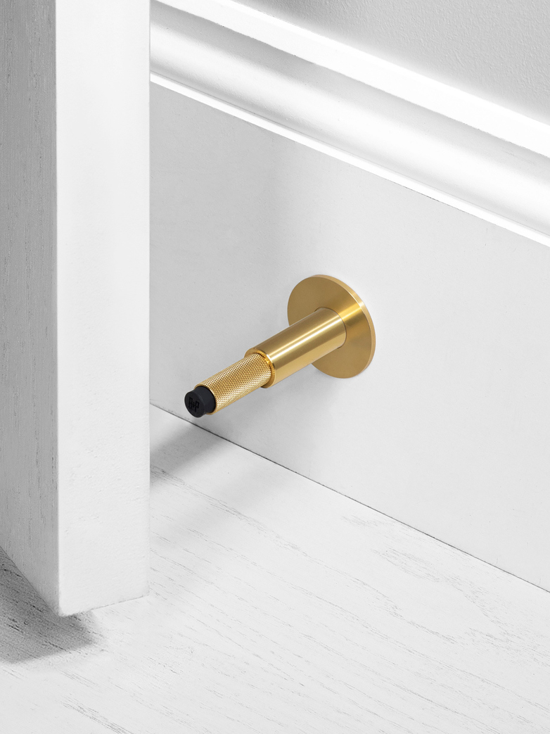 DOOR STOP - WALL MOUNTED, BR
