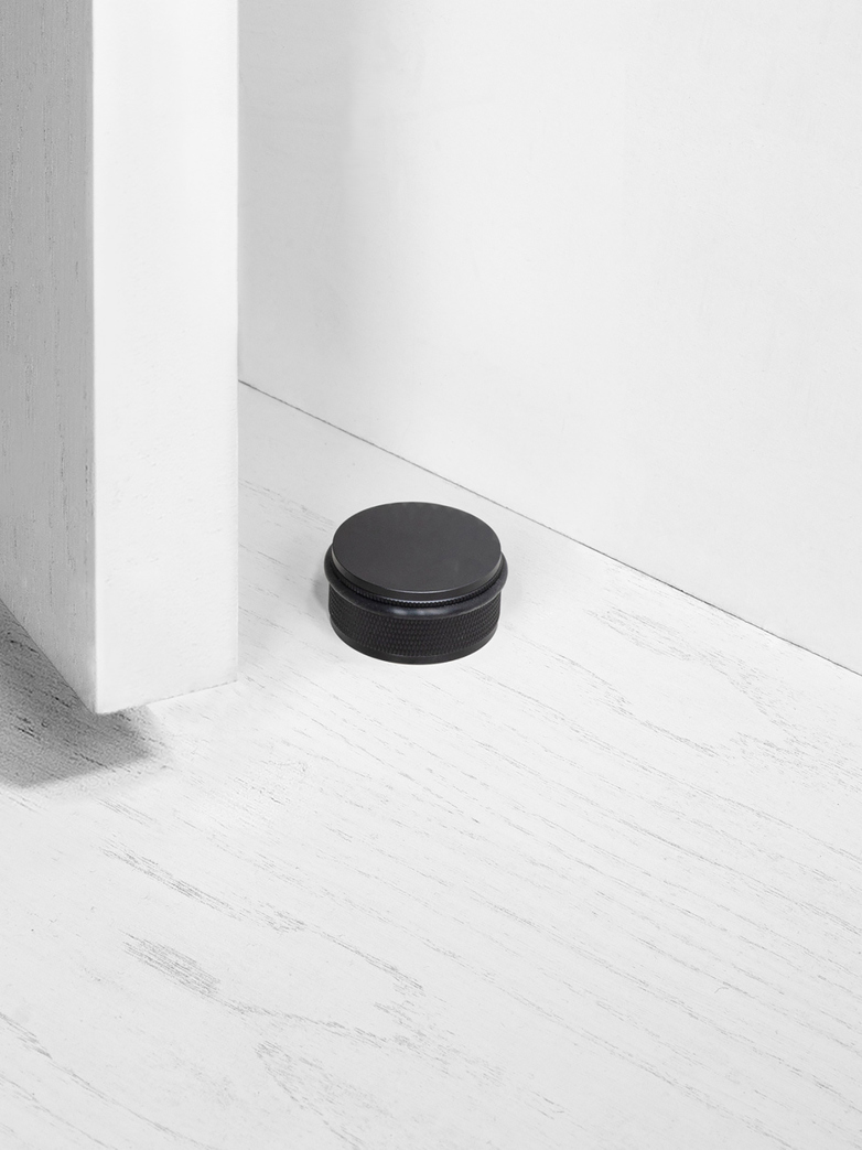DOOR STOP - FLOOR MOUNTED, BL