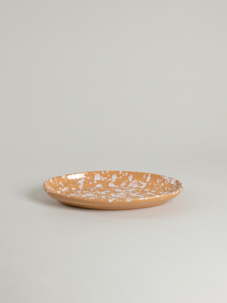 Spruzzi Vivente - Medium Oval Plate - White on Terracotta