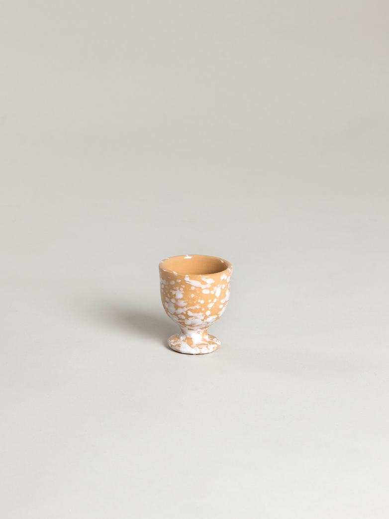 Spruzzi Vivente - Egg Cup - White on Terracotta