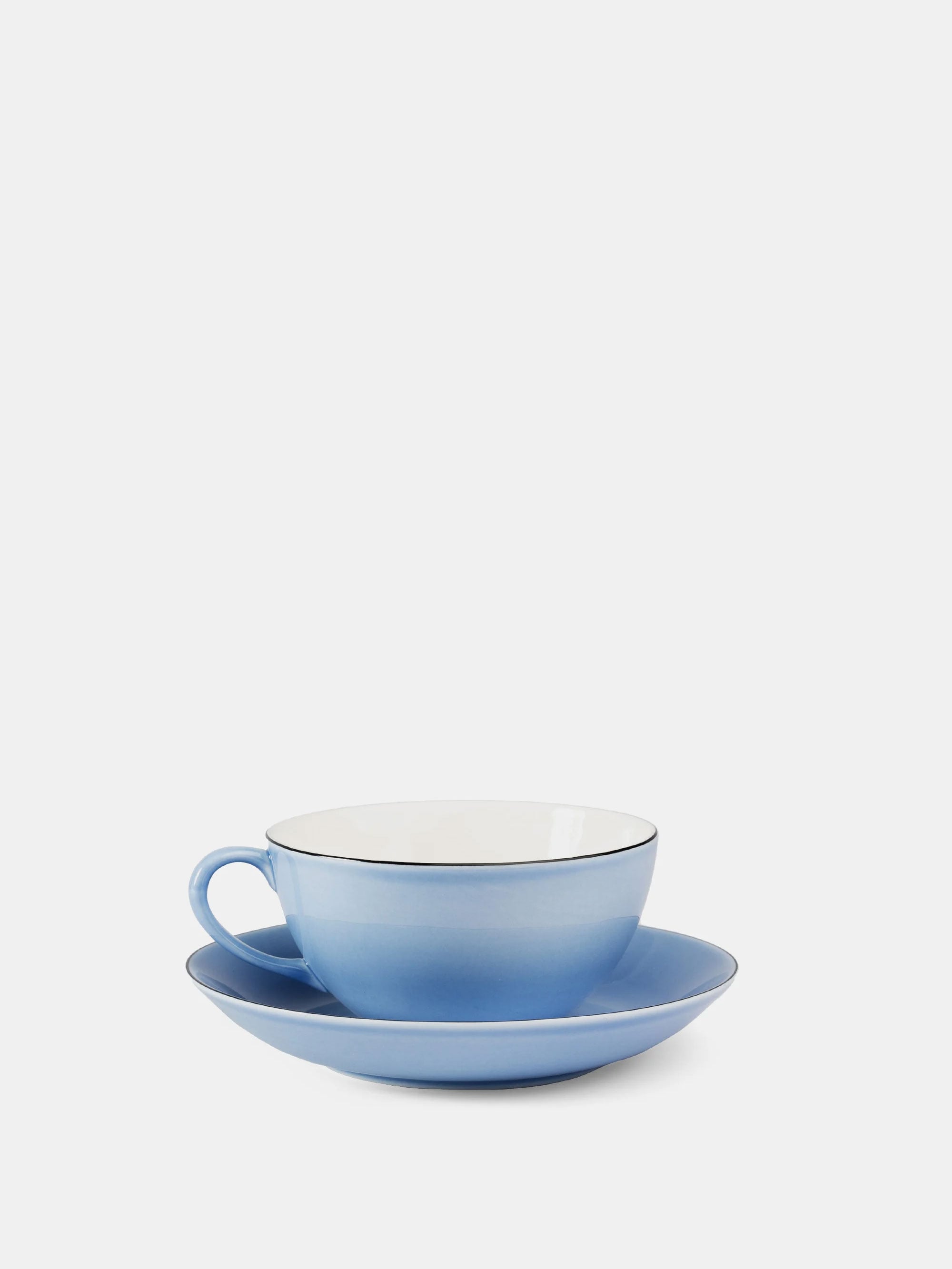 47243 D6d11e93e9 Teacup With Saucer Blue Shift Portrait