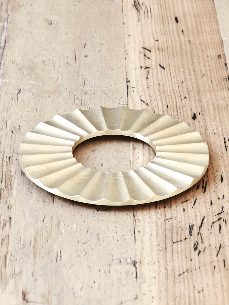 Trivet Sun